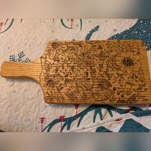 Wood burned decorative cutting board.